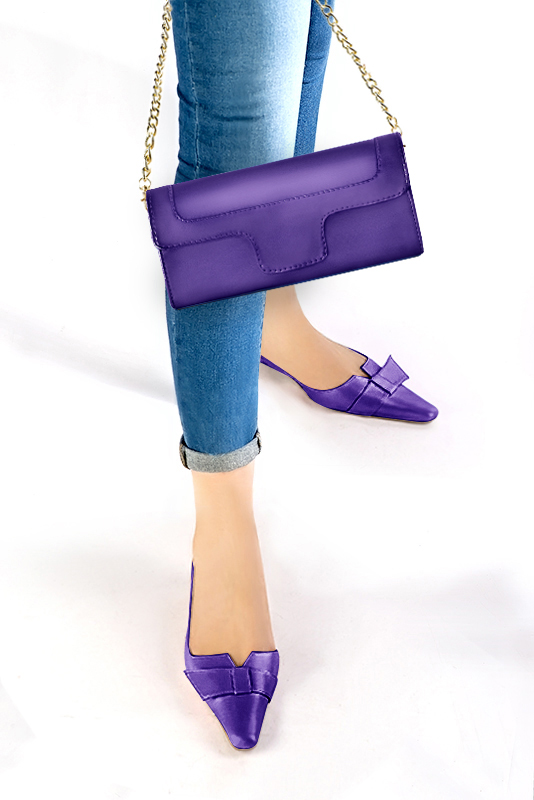 Women's amethyst purple luxurious elegant clutch for ceremonies, weddings and evenings out. - Worn view